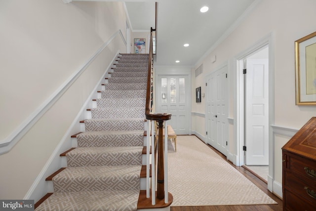 809 Cornell St, Fredericksburg, VA 22401 - staircase featuring visible vents, ornamental molding, wood finished floors, and recessed lighting