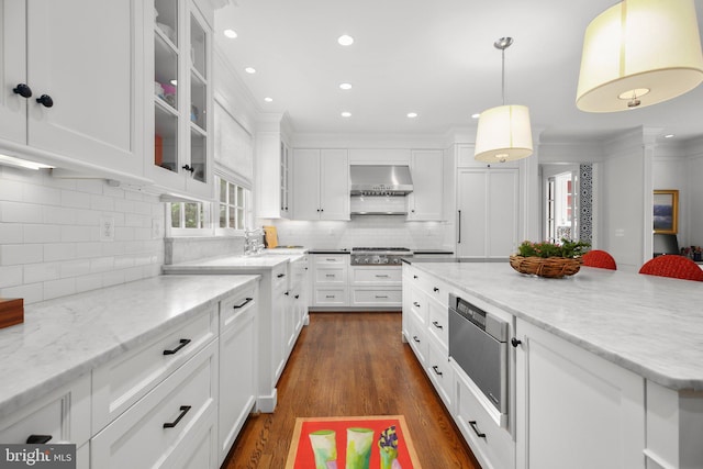 809 Cornell St, Fredericksburg, VA 22401 - kitchen featuring white cabinets, a kitchen island, tasteful backsplash, and stainless steel gas stovetop