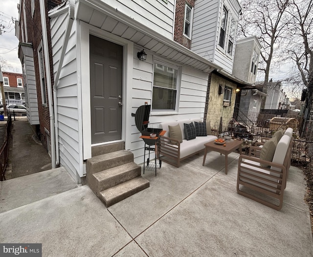 view of patio / terrace with entry steps and an outdoor hangout area