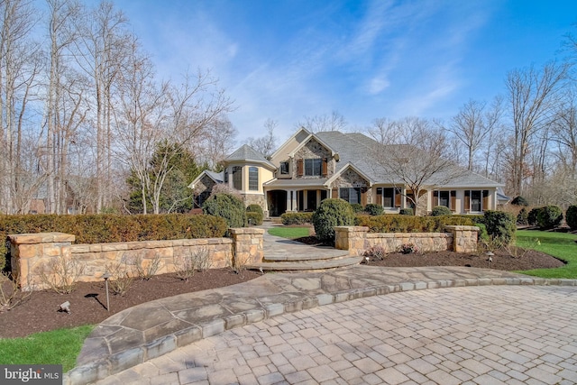 view of front facade featuring stone siding