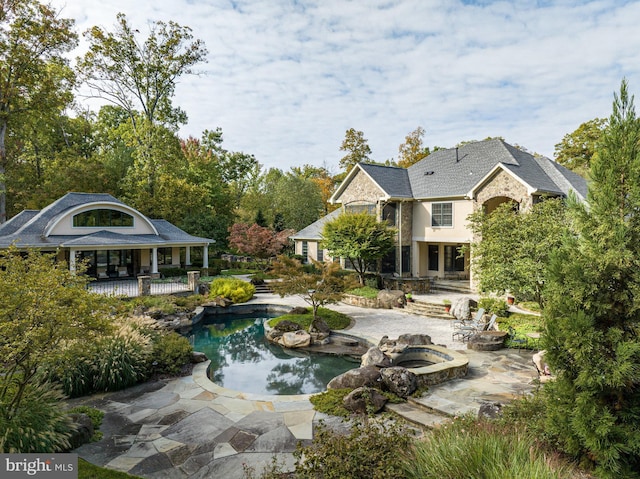 outdoor pool featuring a patio