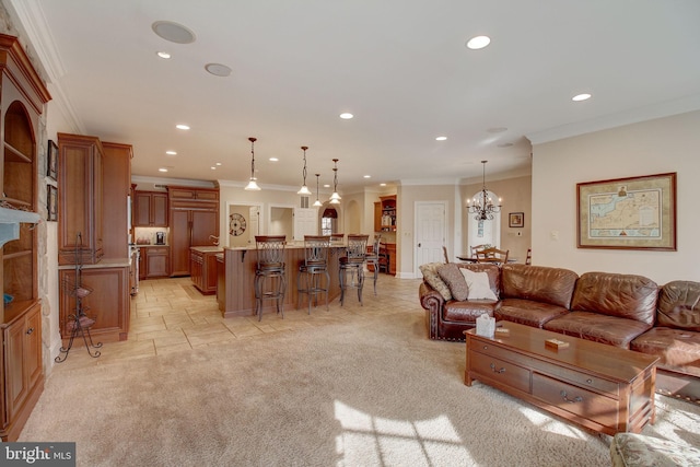 living room with ornamental molding, light colored carpet, and recessed lighting