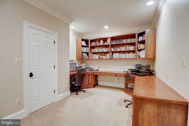 office area featuring light carpet, baseboards, built in study area, ornamental molding, and recessed lighting