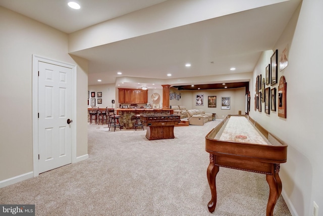 rec room with baseboards, carpet floors, indoor bar, and recessed lighting