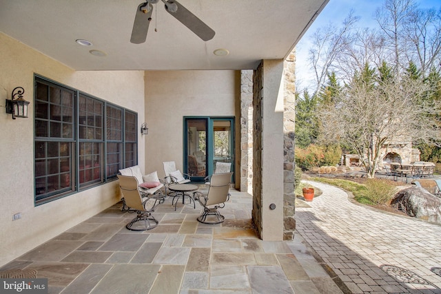 view of patio / terrace featuring a ceiling fan