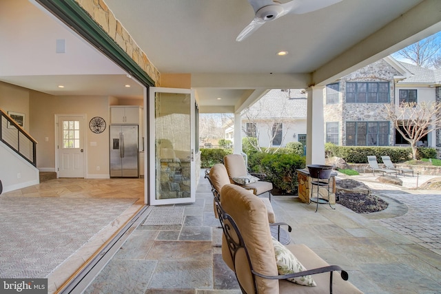 view of patio / terrace with a ceiling fan