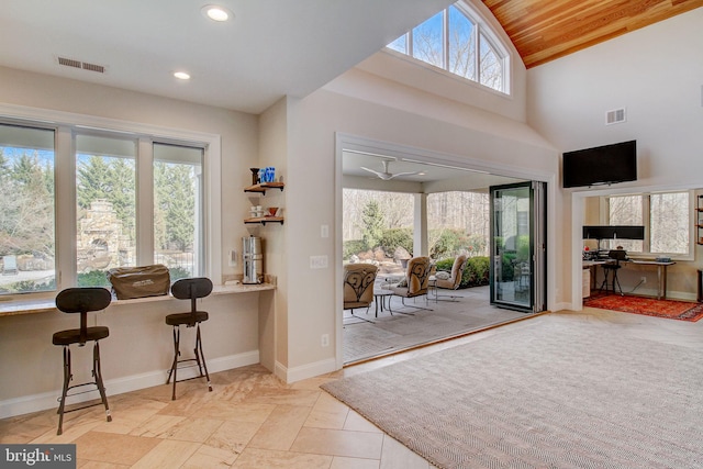 doorway with recessed lighting, wood ceiling, visible vents, and baseboards