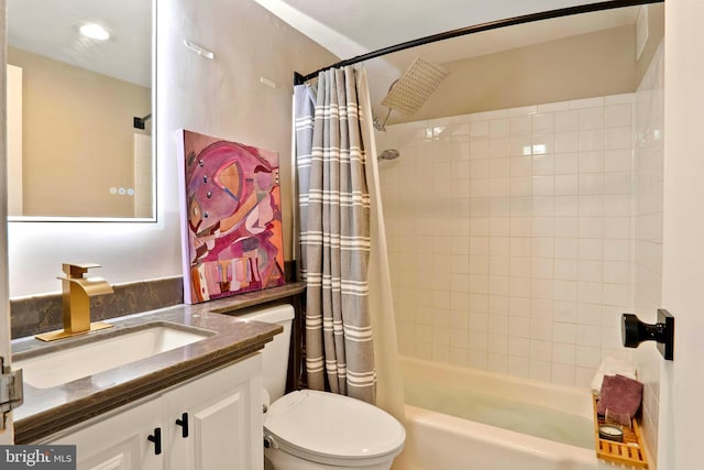 bathroom with toilet, shower / tub combo with curtain, and vanity