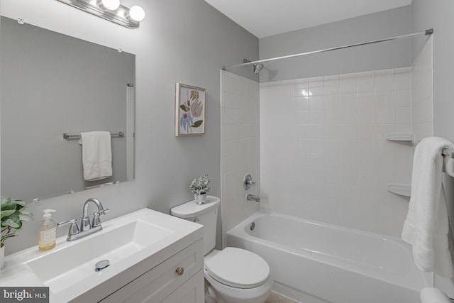 full bath featuring shower / bathing tub combination, vanity, and toilet