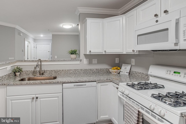 kitchen featuring light stone counters, crown molding, white cabinetry, a sink, and white appliances