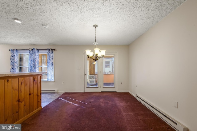 unfurnished dining area with carpet floors, a baseboard radiator, a chandelier, and a textured ceiling