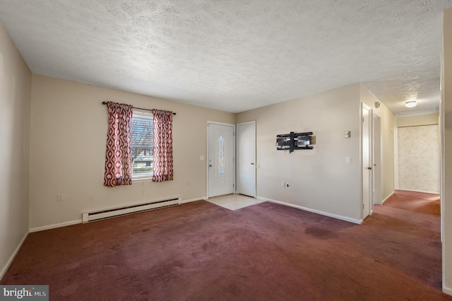 carpeted spare room featuring a textured ceiling, a baseboard radiator, and baseboards