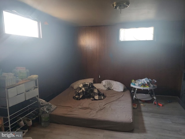 bedroom with wood finished floors