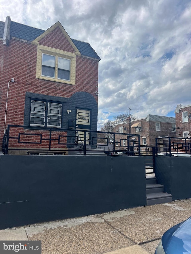 view of front of property with brick siding