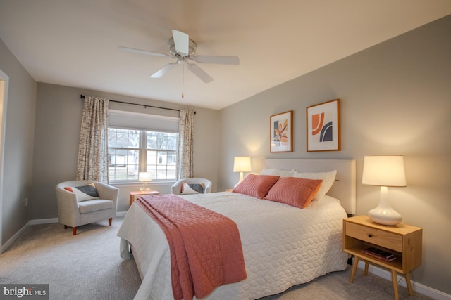 bedroom featuring carpet floors, baseboards, and a ceiling fan