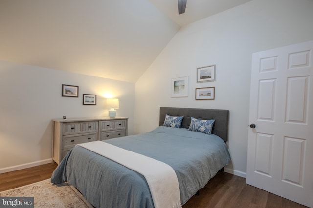 bedroom featuring a ceiling fan, lofted ceiling, dark wood-style flooring, and baseboards