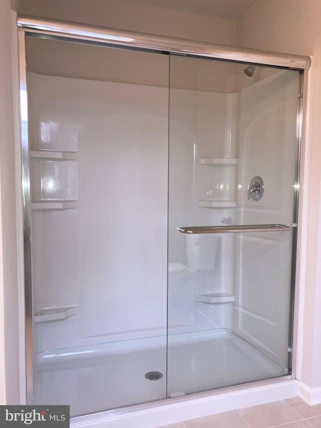 full bath featuring a stall shower