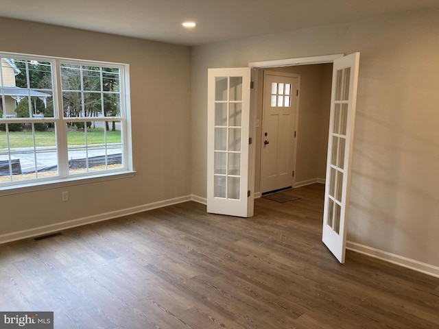 entryway with baseboards, visible vents, dark wood finished floors, french doors, and recessed lighting