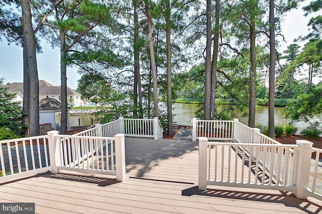 deck featuring a water view