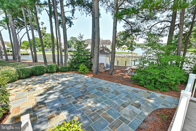 view of patio / terrace featuring a water view