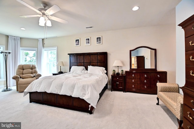 bedroom featuring ceiling fan, carpet floors, visible vents, and recessed lighting