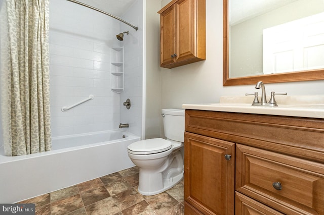 full bath with stone finish floor, vanity, toilet, and shower / bathtub combination with curtain