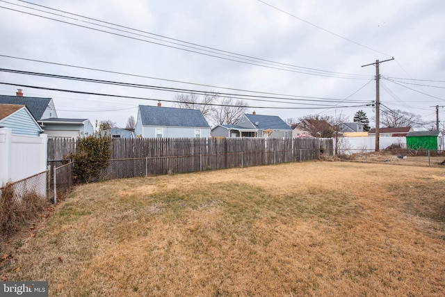 view of yard featuring a fenced backyard