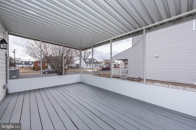 wooden deck with a residential view