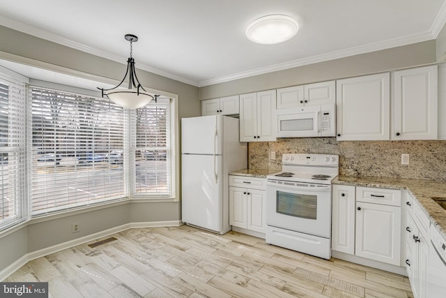 kitchen with visible vents, white cabinets, white appliances, and ornamental molding