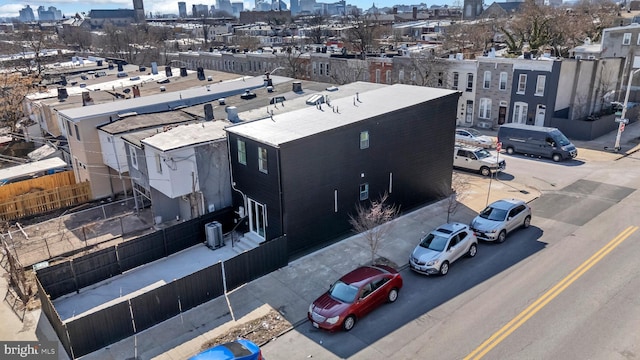 birds eye view of property with a view of city