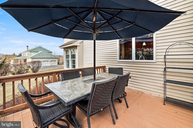 deck featuring outdoor dining space