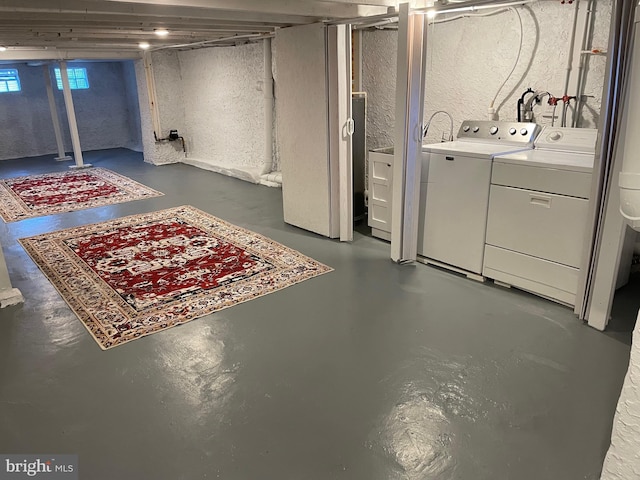 basement featuring washer and dryer