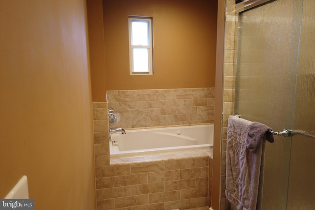 4136 E Capitol St NE, Washington, DC 20019 - full bathroom with a bath and a shower with shower door