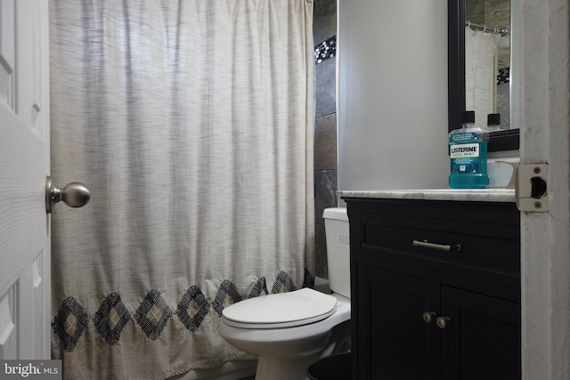 4136 E Capitol St NE, Washington, DC 20019 - bathroom with vanity, toilet, and a shower with shower curtain