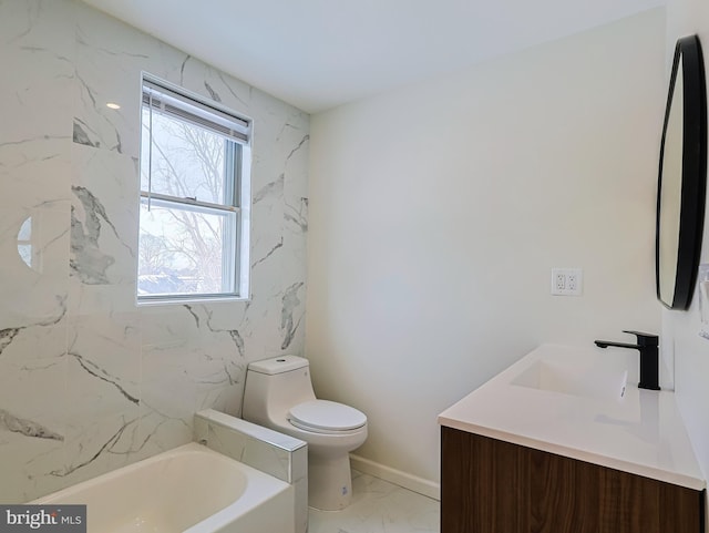 bathroom featuring a bathtub, marble finish floor, vanity, and toilet