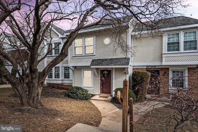 multi unit property featuring brick siding