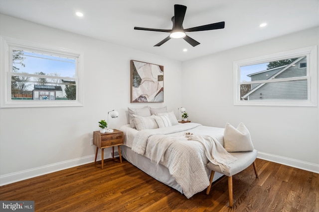 bedroom featuring recessed lighting, wood finished floors, a ceiling fan, and baseboards