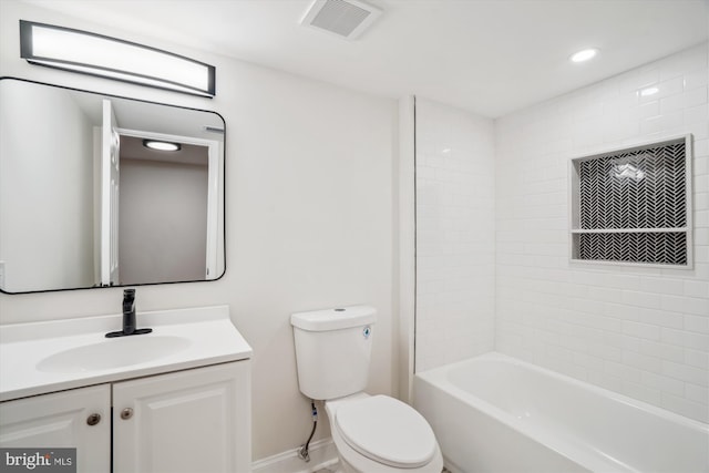 bathroom with baseboards, visible vents, toilet, vanity, and shower / bathing tub combination