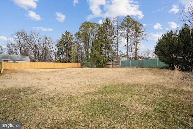 view of yard with fence