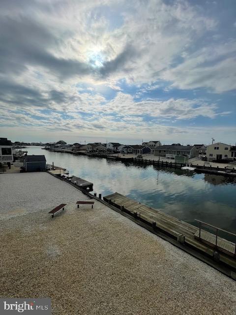 water view featuring a dock