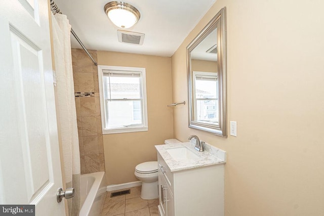 bathroom featuring tile patterned flooring, visible vents, vanity, and toilet