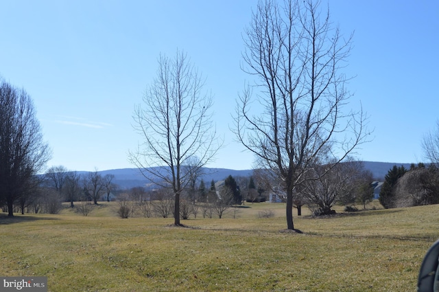 property view of mountains featuring a rural view