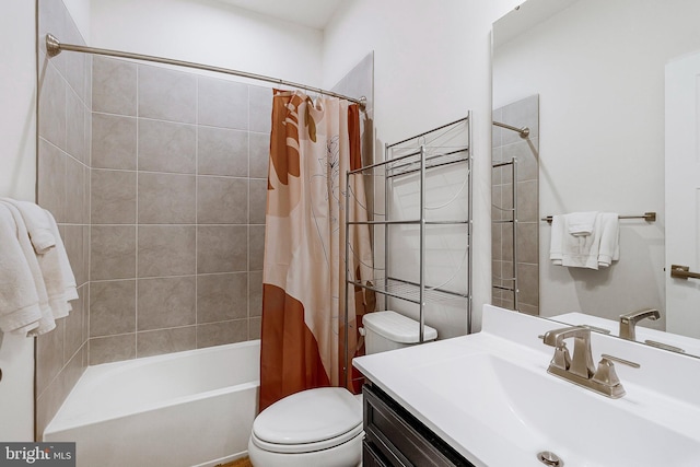 full bath featuring toilet, shower / tub combo, and vanity