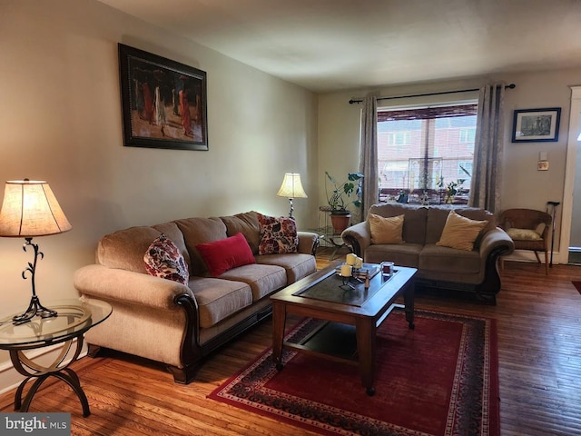 living room with wood finished floors