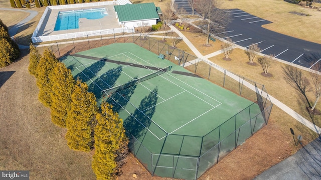 view of sport court with fence