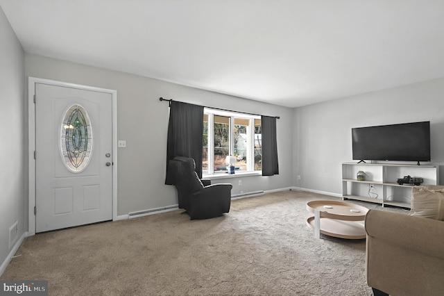 carpeted living room featuring baseboard heating, visible vents, and baseboards