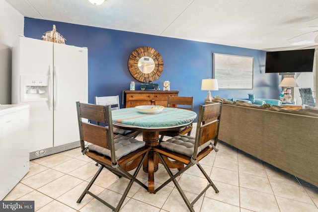 dining room featuring light tile patterned floors