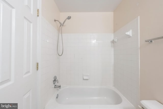 full bathroom featuring shower / bath combination and toilet