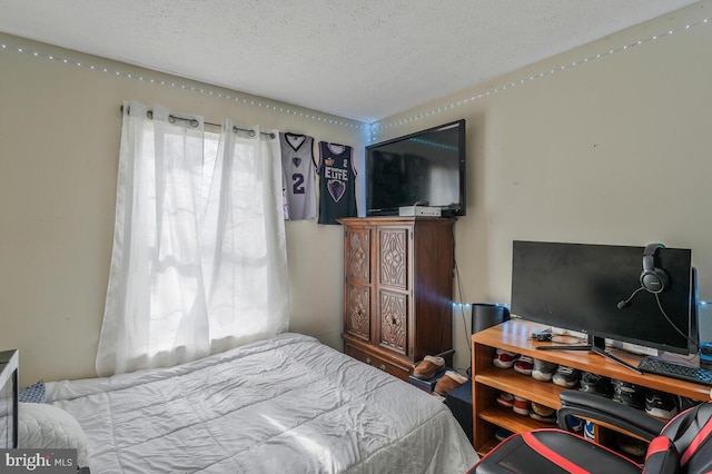 bedroom with a textured ceiling