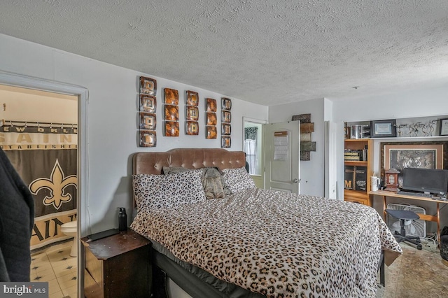 bedroom with a textured ceiling